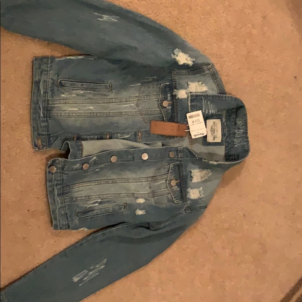 Ripped jean jacket never been worn